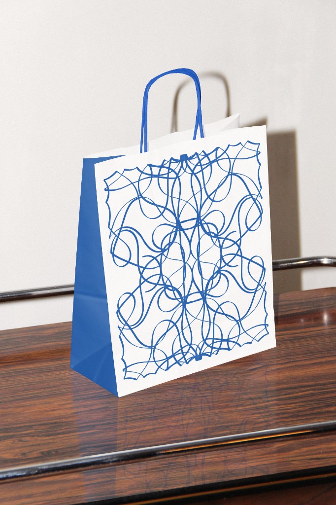 Blue and white Cake Picnic shopping bag with generative ornament