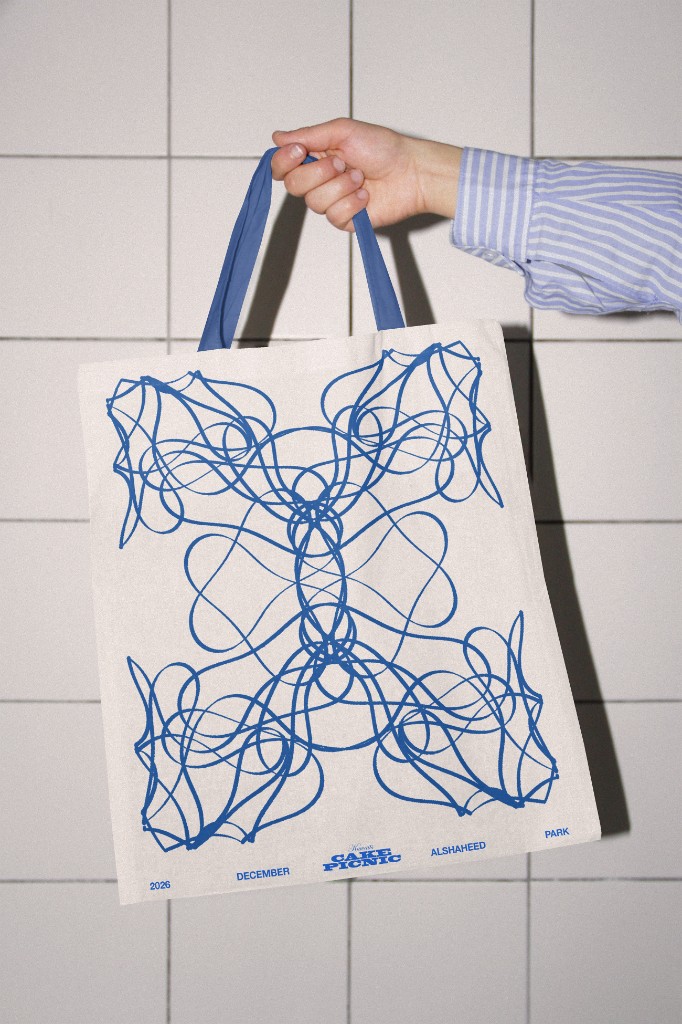 Cream Cake Picnic tote bag with blue generative ornament and event details